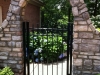 Aluminum gate between arch